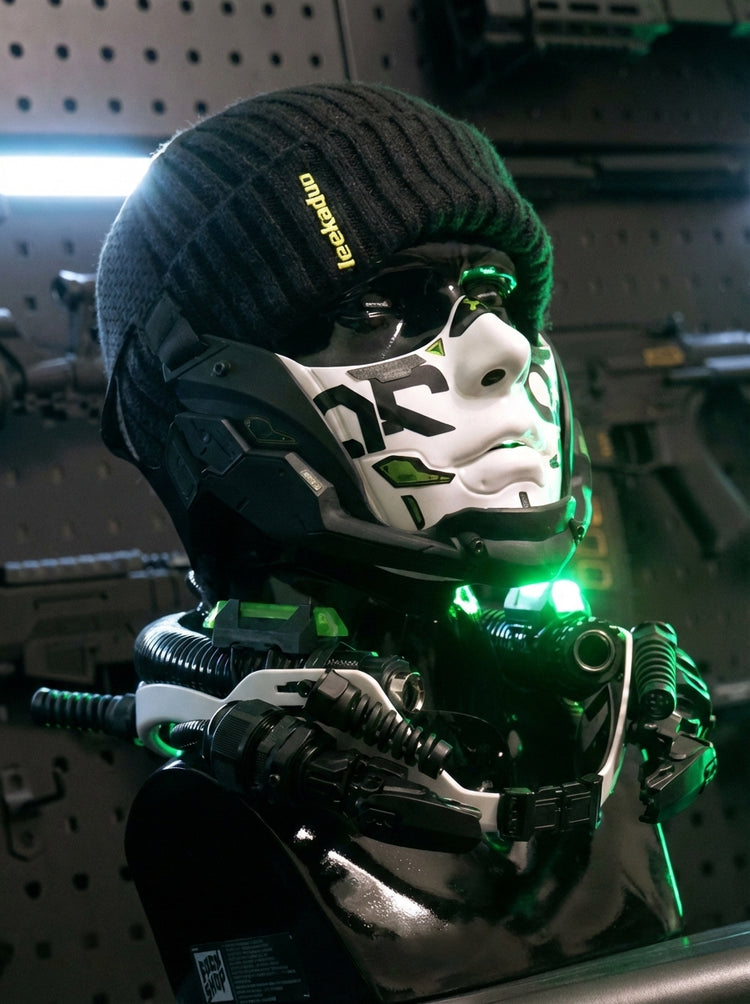 FOCKSHOP sharp-chin mask — off-white version styled with a black helmet and headset.