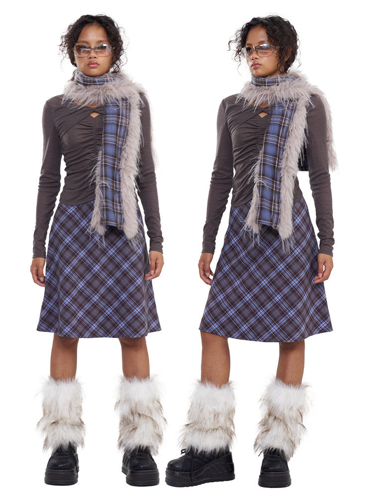NEXT PASSPORT blue-purple plaid faux-fur scarf — full-length front styling collage showing the drape