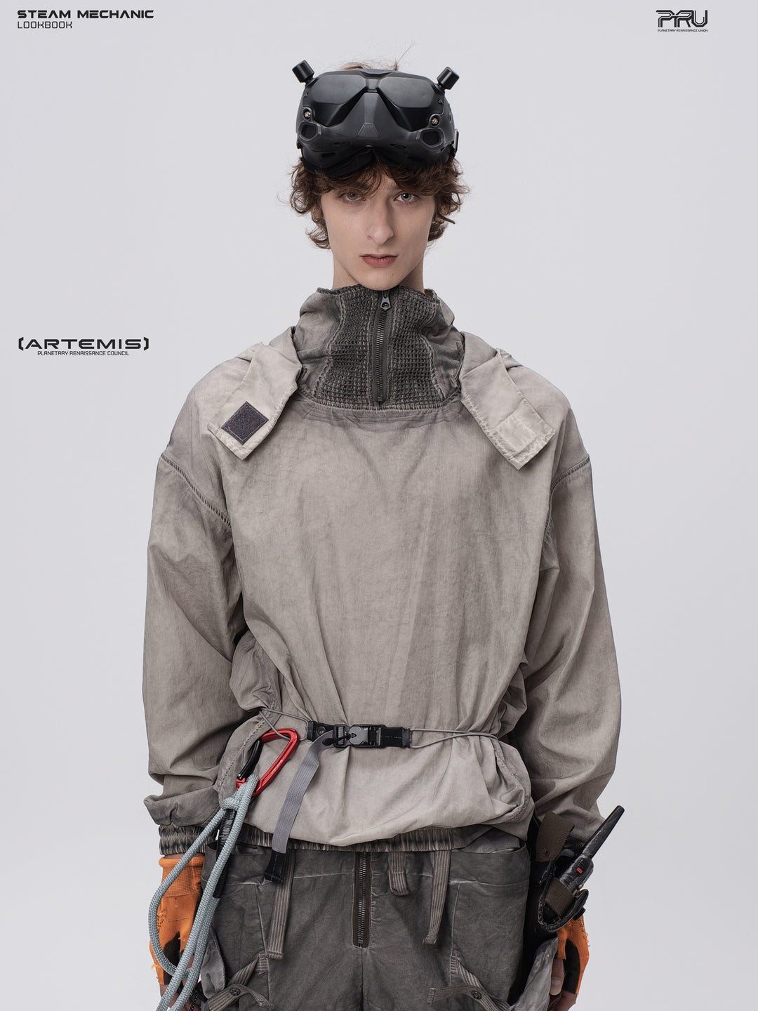 PIONEER meteorite-gray mesh hoodie, front modeled view showing weathered panels and hood flaps
