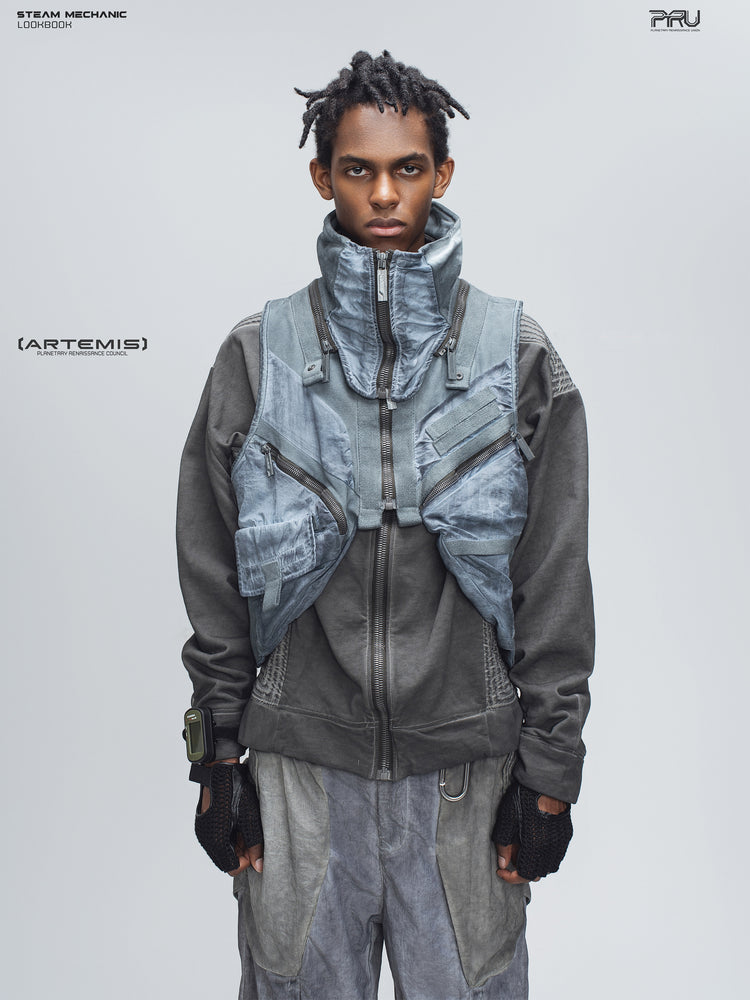 FISSION modular vest in star blue, front modeled view showing the high collar and cargo pockets