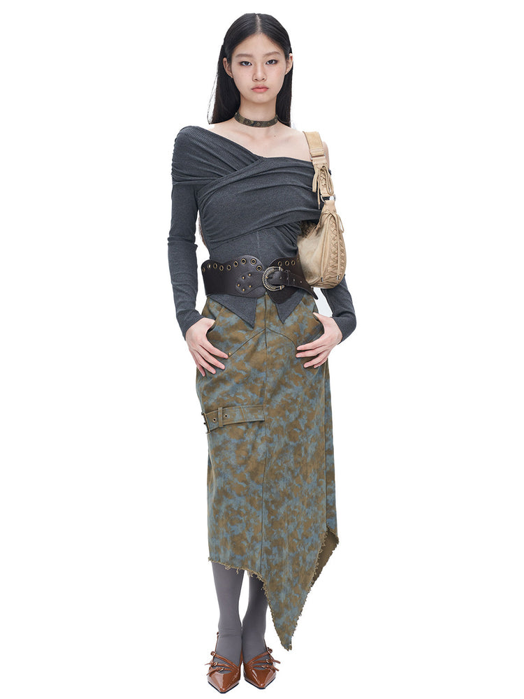 NEXT PASSPORT blue-brown tie-dye asymmetric denim midi skirt — front modeled view with hands at the hips.
