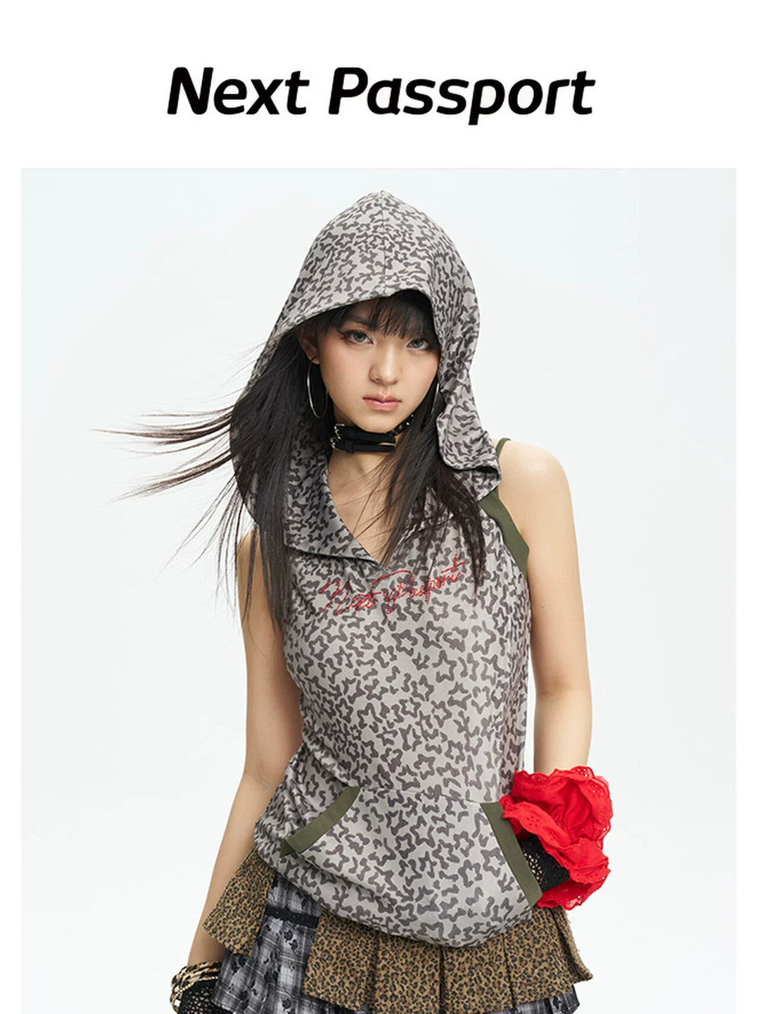NEXT PASSPORT rhinestone leopard-print hooded vest on a white studio background