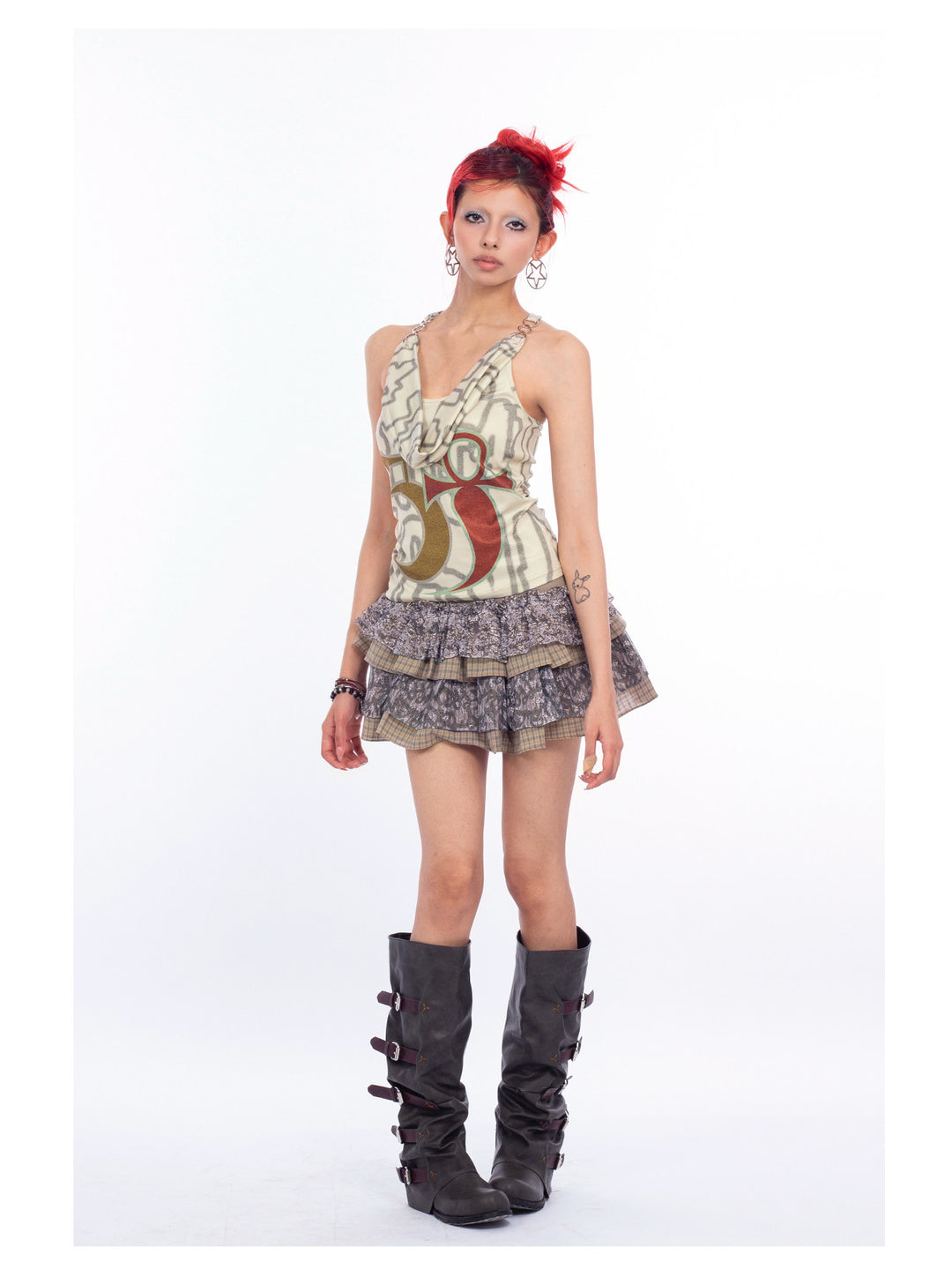 4RE1GN SIGIL cowl-neck halter top in ivory multicolor — full-length front modeled view with a layered printed mini skirt