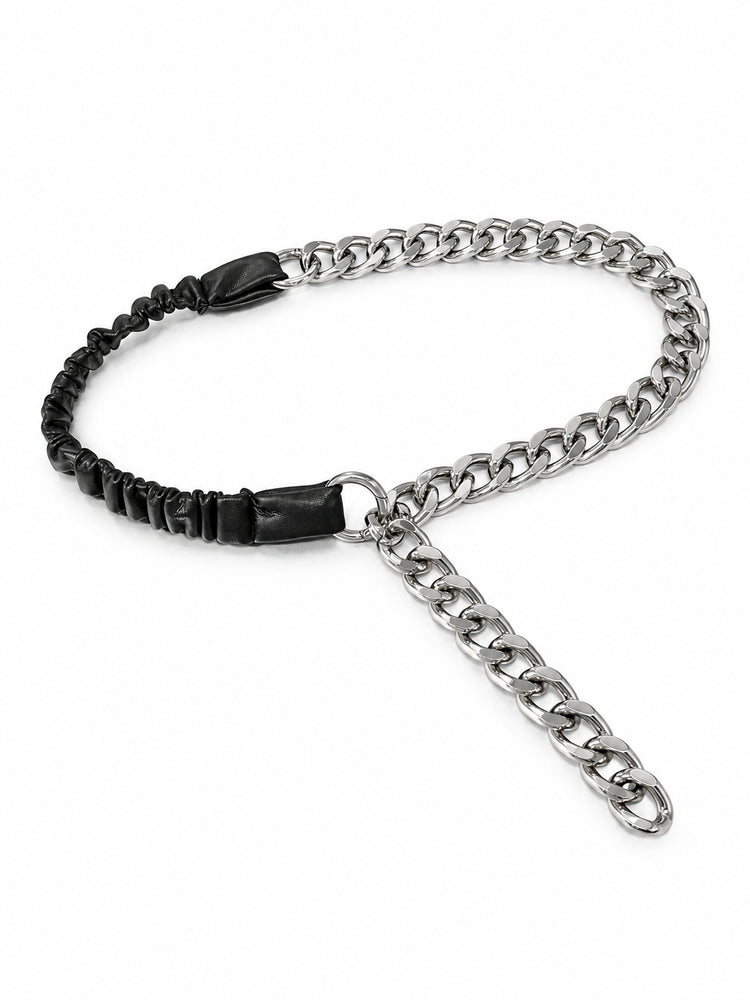 WRAVEN gathered faux-leather curb-chain belt with silver-tone chain and round connectors on white.