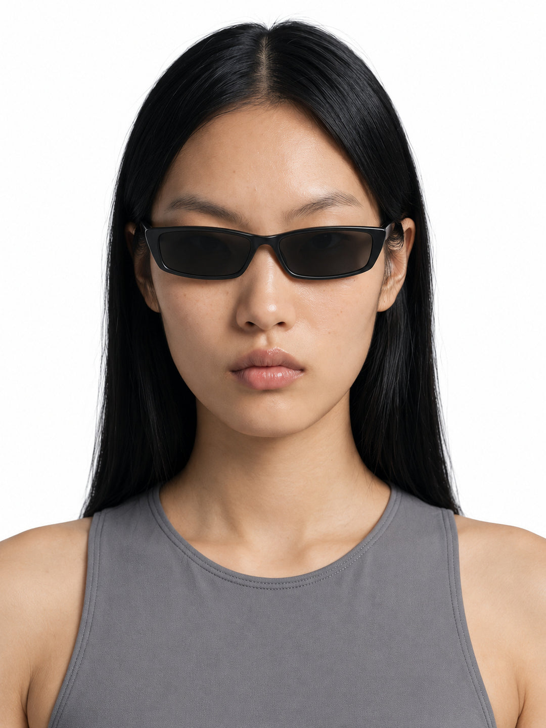 RETRO SPECTRUM black narrow rectangular sunglasses worn by Chell, front studio view