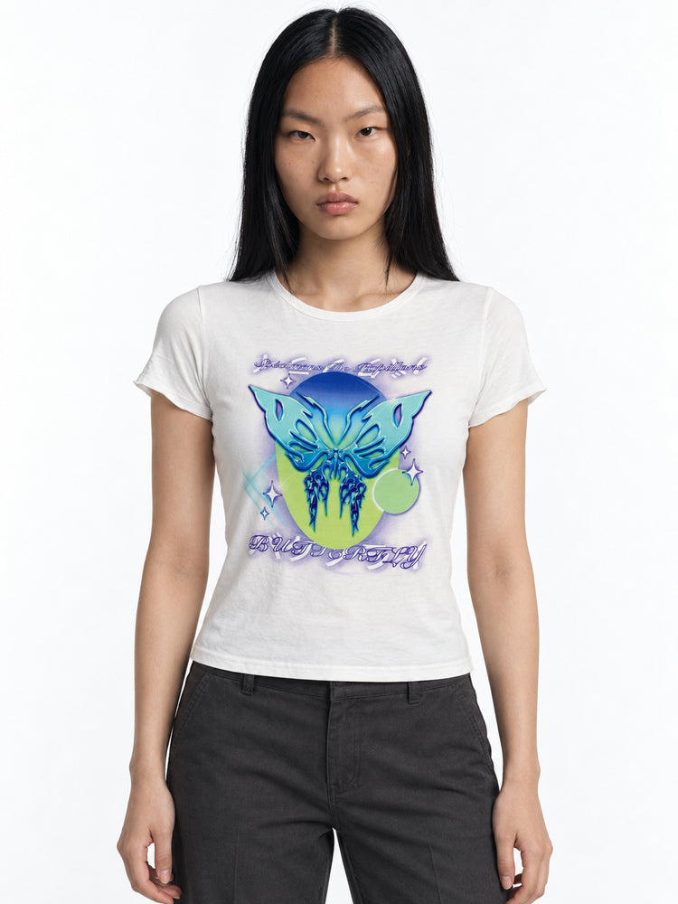 Model wearing the fitted white Alien Butterfly Fairy graphic tee, front view.