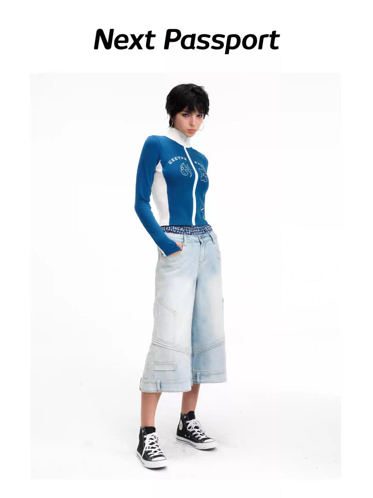 Three-quarter modeled view of the light-blue cropped wide-leg jeans