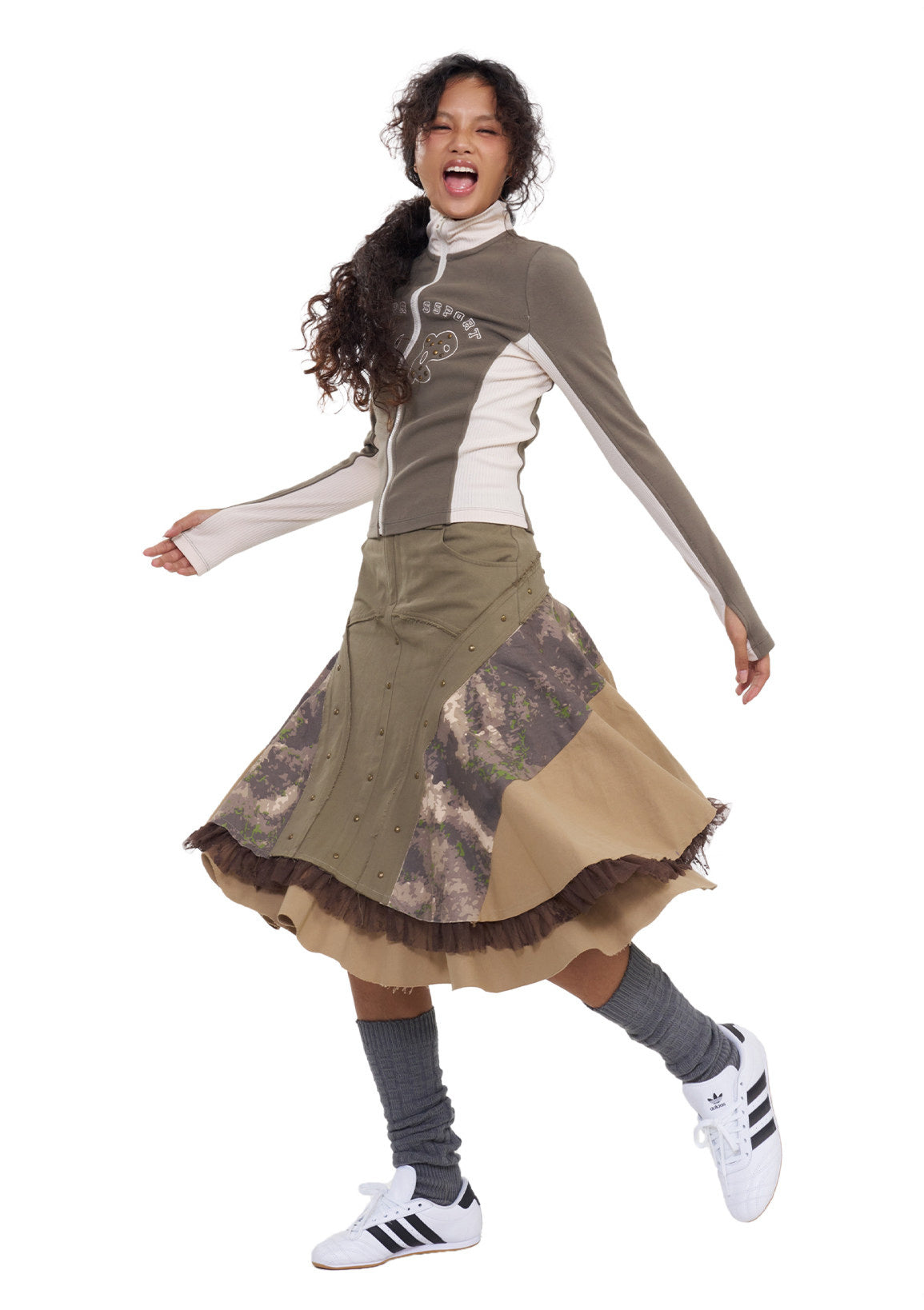 NEXT PASSPORT camouflage three-panel flared midi skirt, full-length movement view