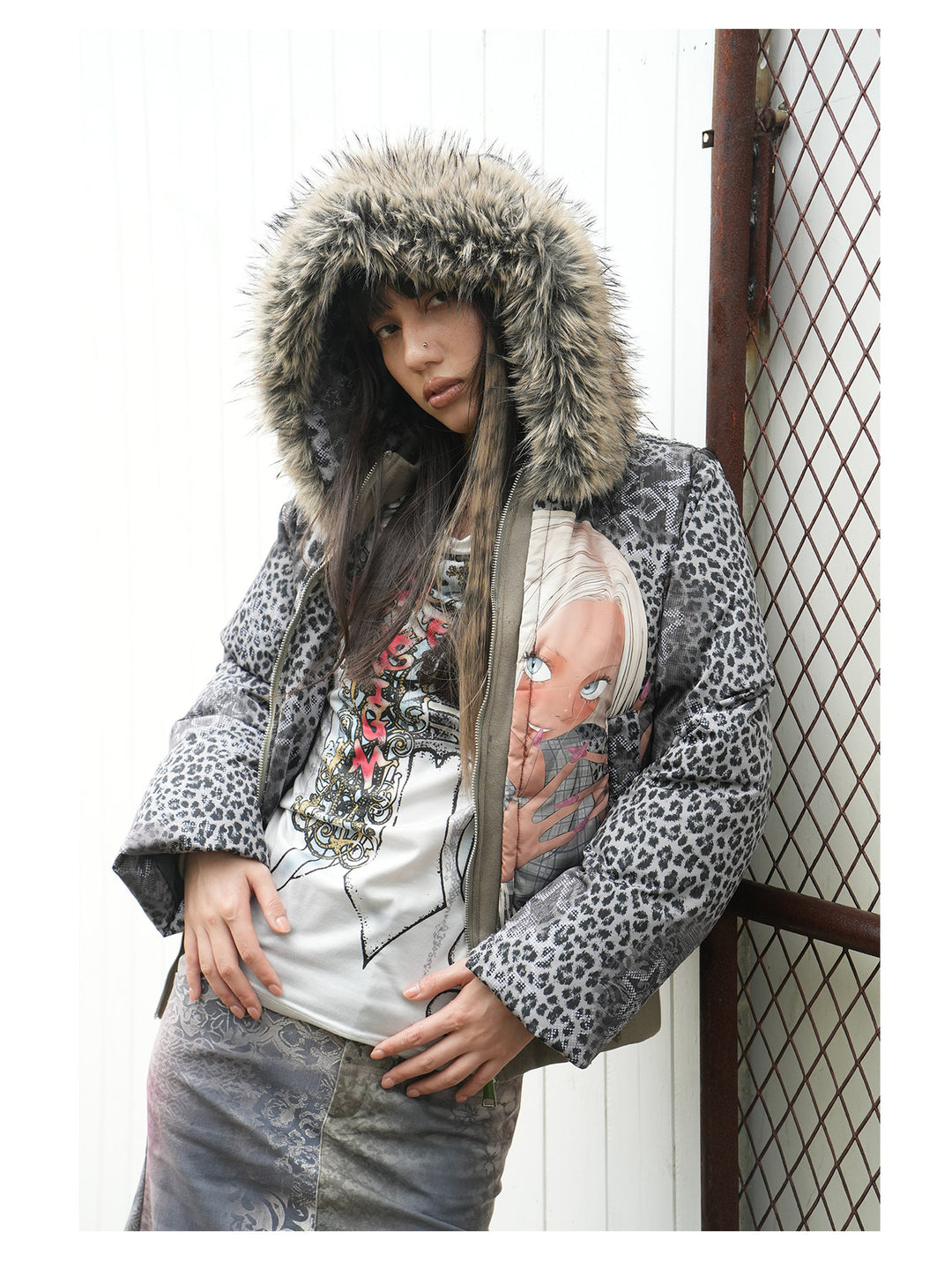 4RE1GN NAILS DONE leopard graphic down jacket in gray multicolor — close modeled view with the furry-trimmed hood up