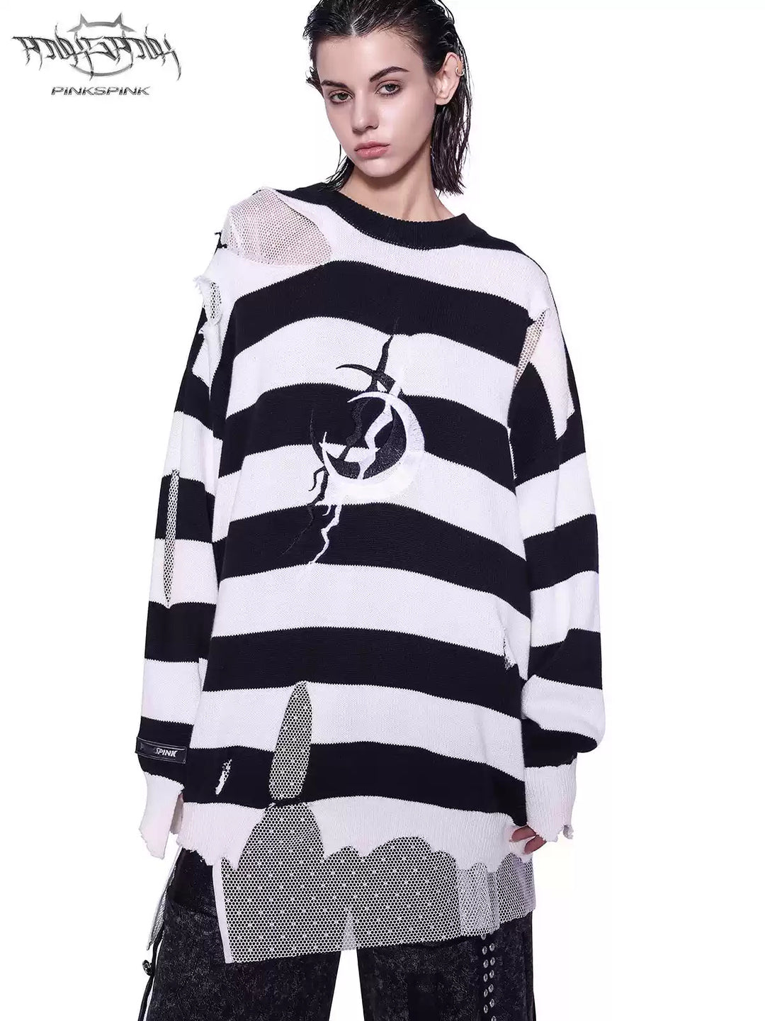 PINKSPINK ELECTRIC MOON distressed striped sweater in BLACK WHITE STRIPE — front close view with black-and-white stripes and offset chest embroidery.