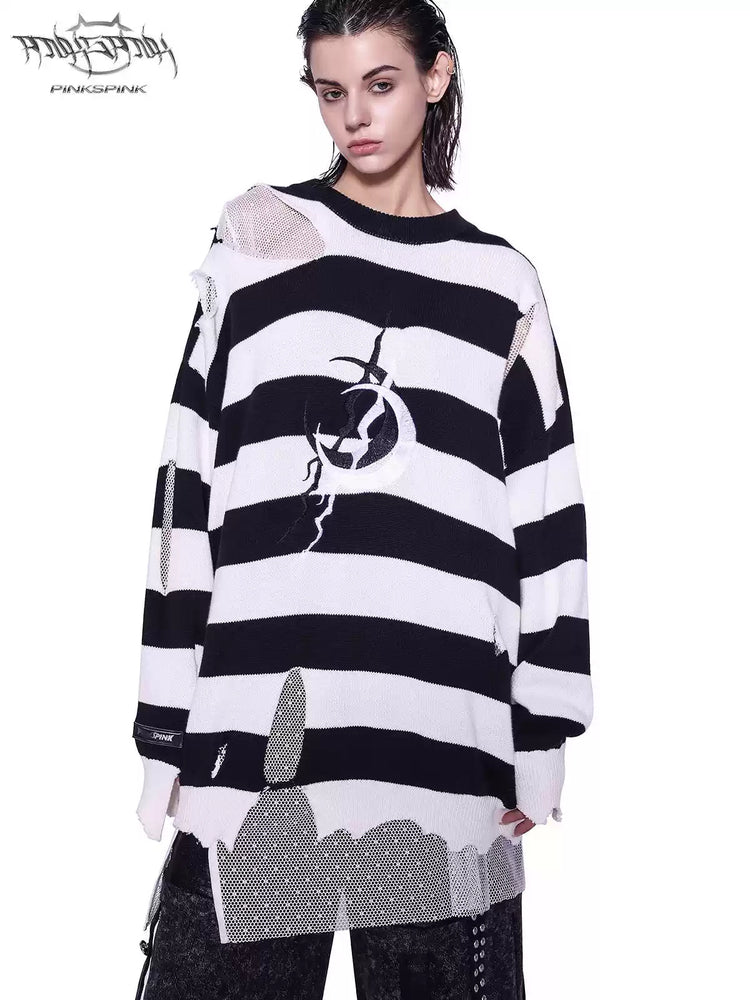 PINKSPINK ELECTRIC MOON distressed striped sweater in BLACK WHITE STRIPE — front close view with black-and-white stripes and offset chest embroidery.