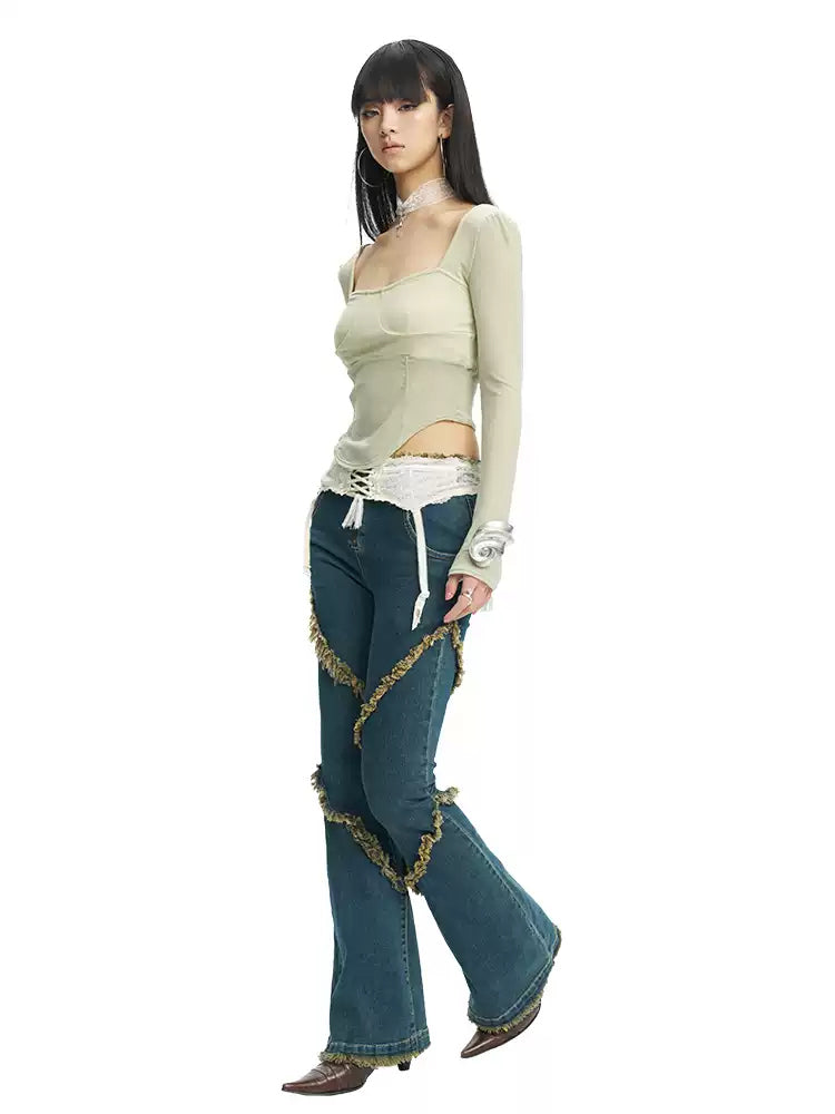 NEXT PASSPORT deep-blue frayed-hem slim flare jeans in denim blue — three-quarter walking modeled view on white.