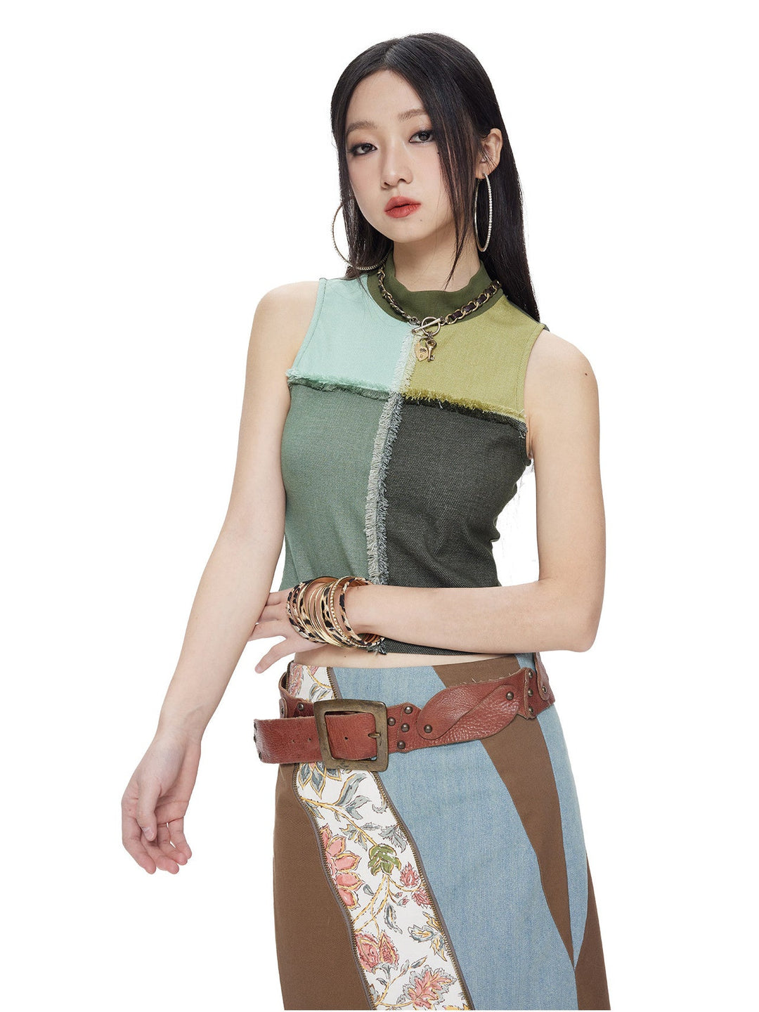 NEXT PASSPORT mesh-panel mock-neck vest in field green, clean white-background three-quarter studio view.