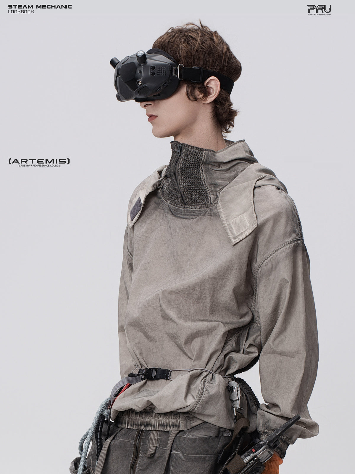 PIONEER meteorite-gray mesh hoodie, three-quarter close view with goggles lowered
