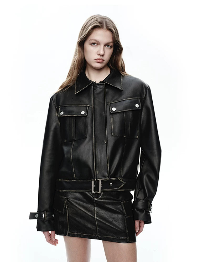 NEXT PASSPORT distressed black PU jacket and cargo-pocket mini skirt set, front modeled view