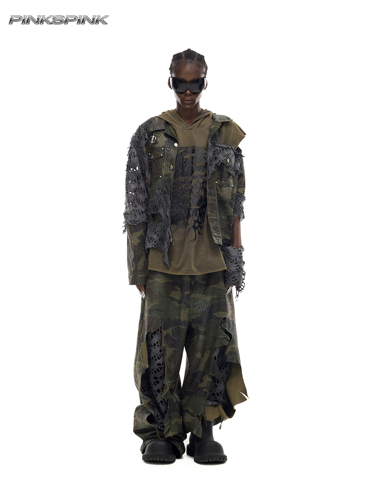 PINKSPINK ELECTRIC MOON distressed camouflage denim jacket — front full-length modeled view layered over an olive hooded top