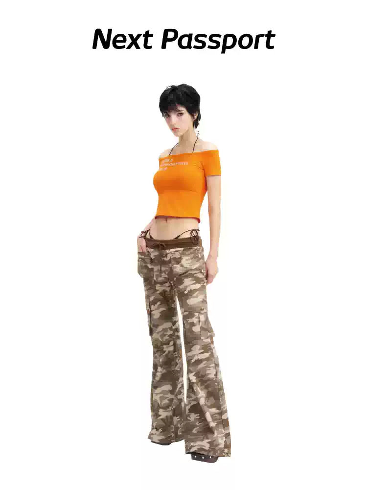 NEXT PASSPORT camouflage ribbed-waist flared pants — full-length three-quarter modeled view.