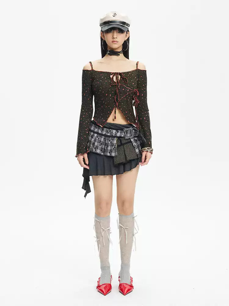 Full-length three-quarter view of the leopard off-shoulder knit top