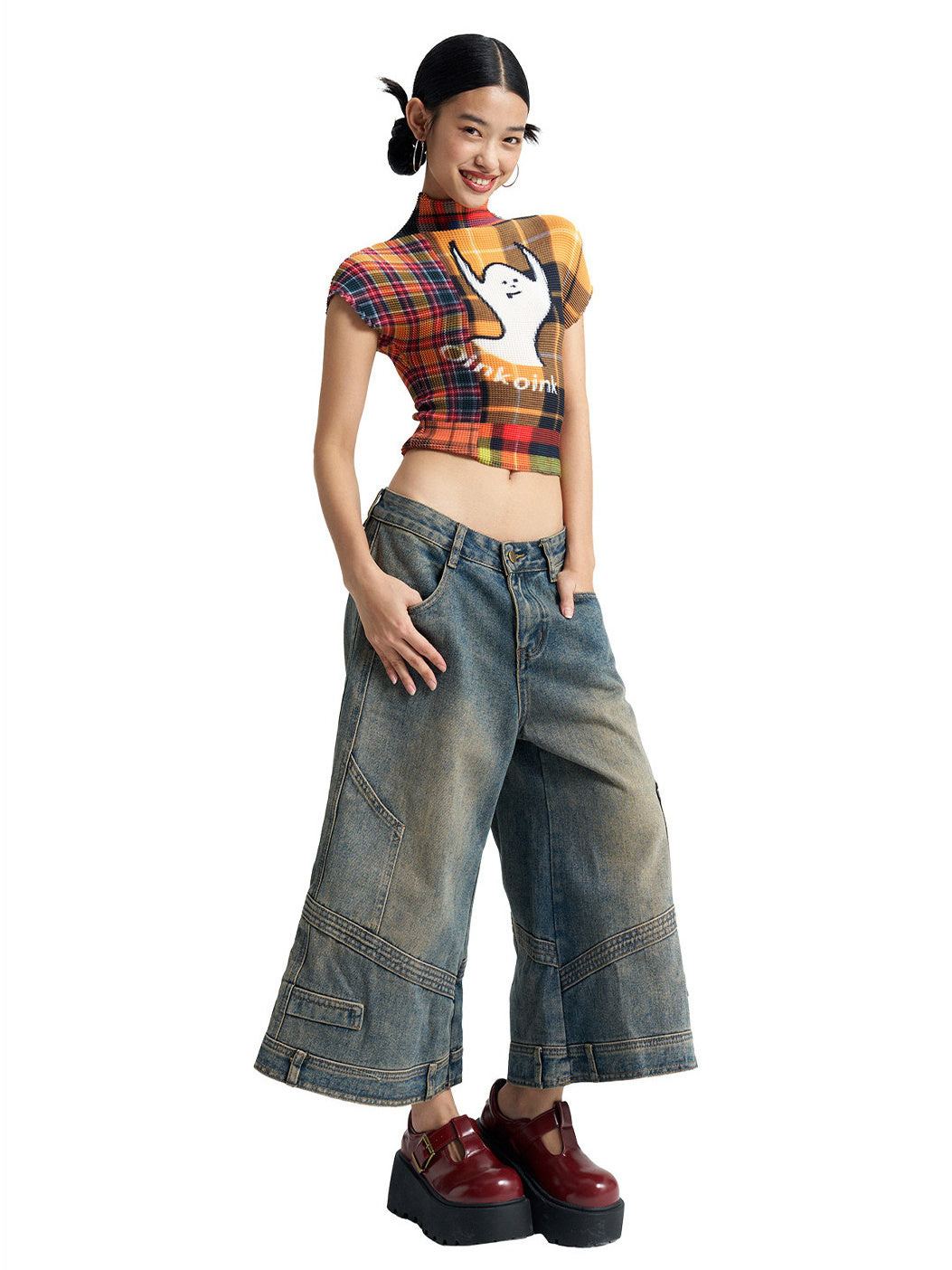 Three-quarter view of NEXT PASSPORT deconstructed wide-leg denim capri pants
