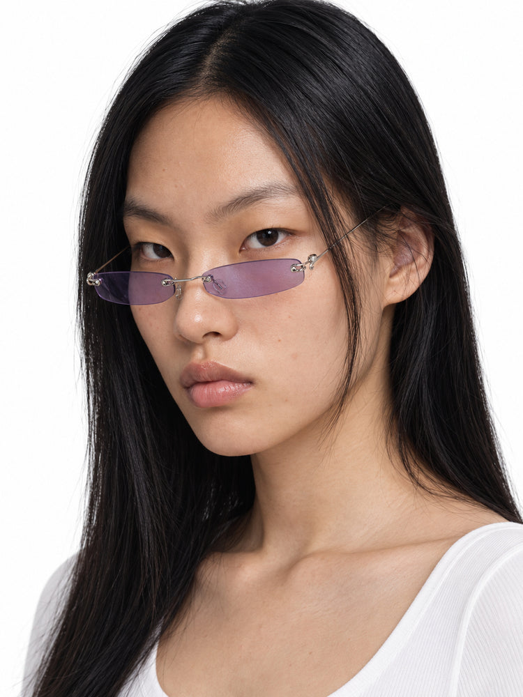 OFF-LABEL purple narrow rimless sunglasses — three-quarter studio try-on