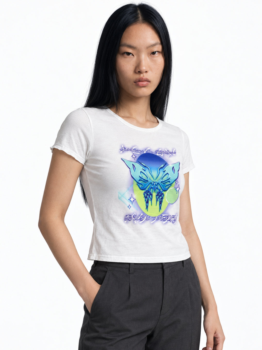 Three-quarter modeled view of the white butterfly graphic tee showing its short sleeves and fitted shape.