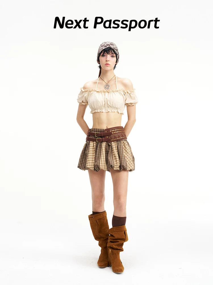 Side modeled view of the voluminous brown plaid pumpkin skirt