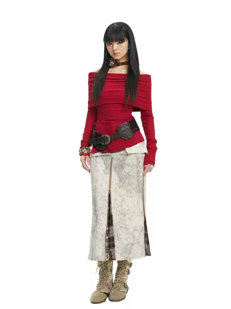Straight-on front view of the plaid-insert zip midi skirt