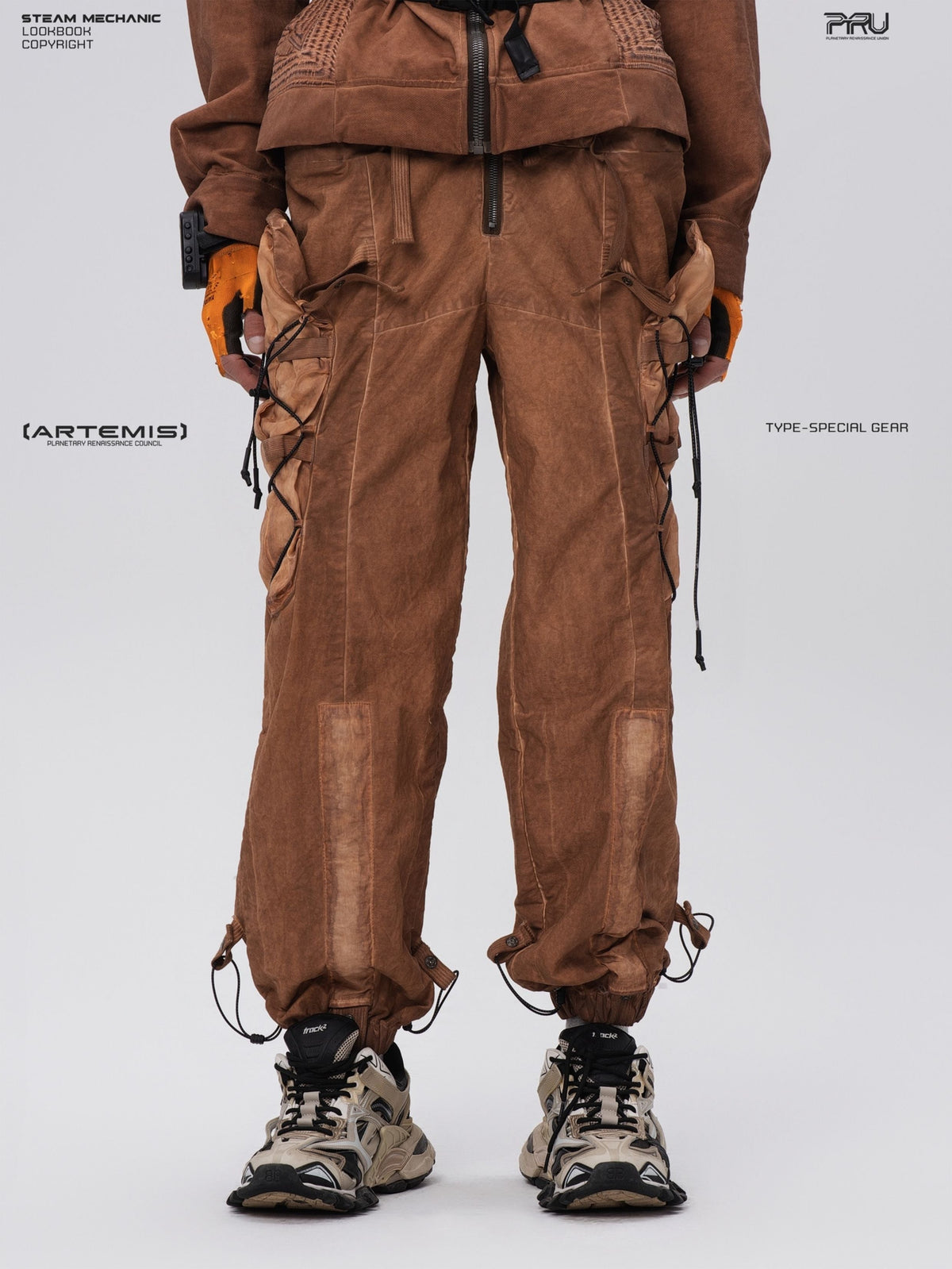 PIONEER cargo pants in Corona Orange, modeled front view with paneled construction