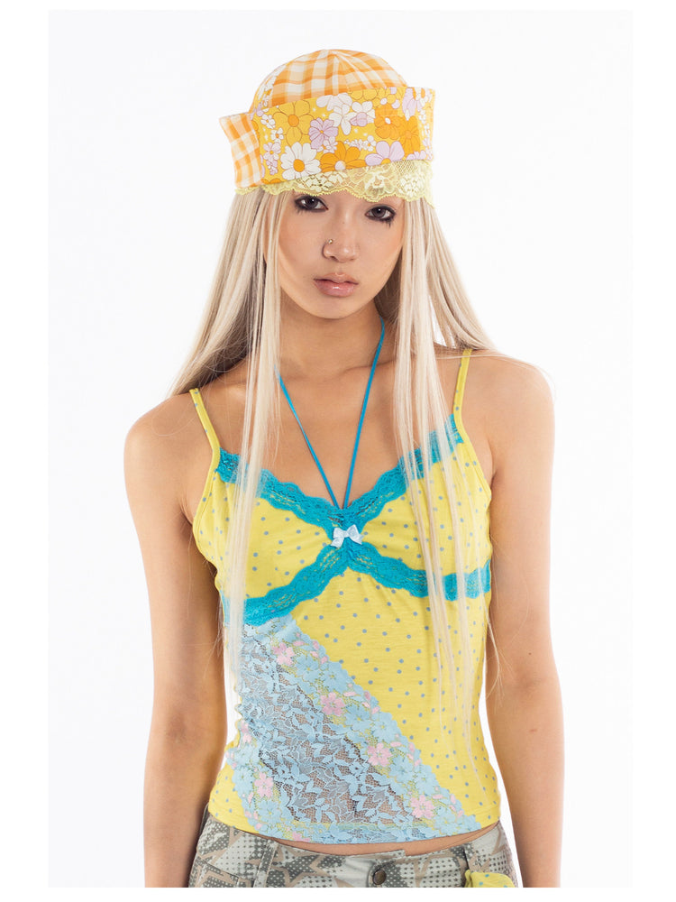 4RE1GN MYSTIC printed brimless hat — yellow floral and gingham print — front modeled view