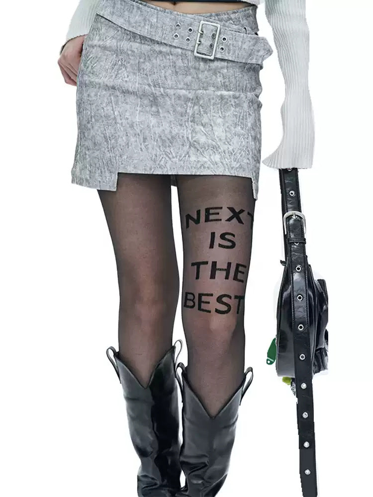NEXT PASSPORT flocked-letter tights front detail