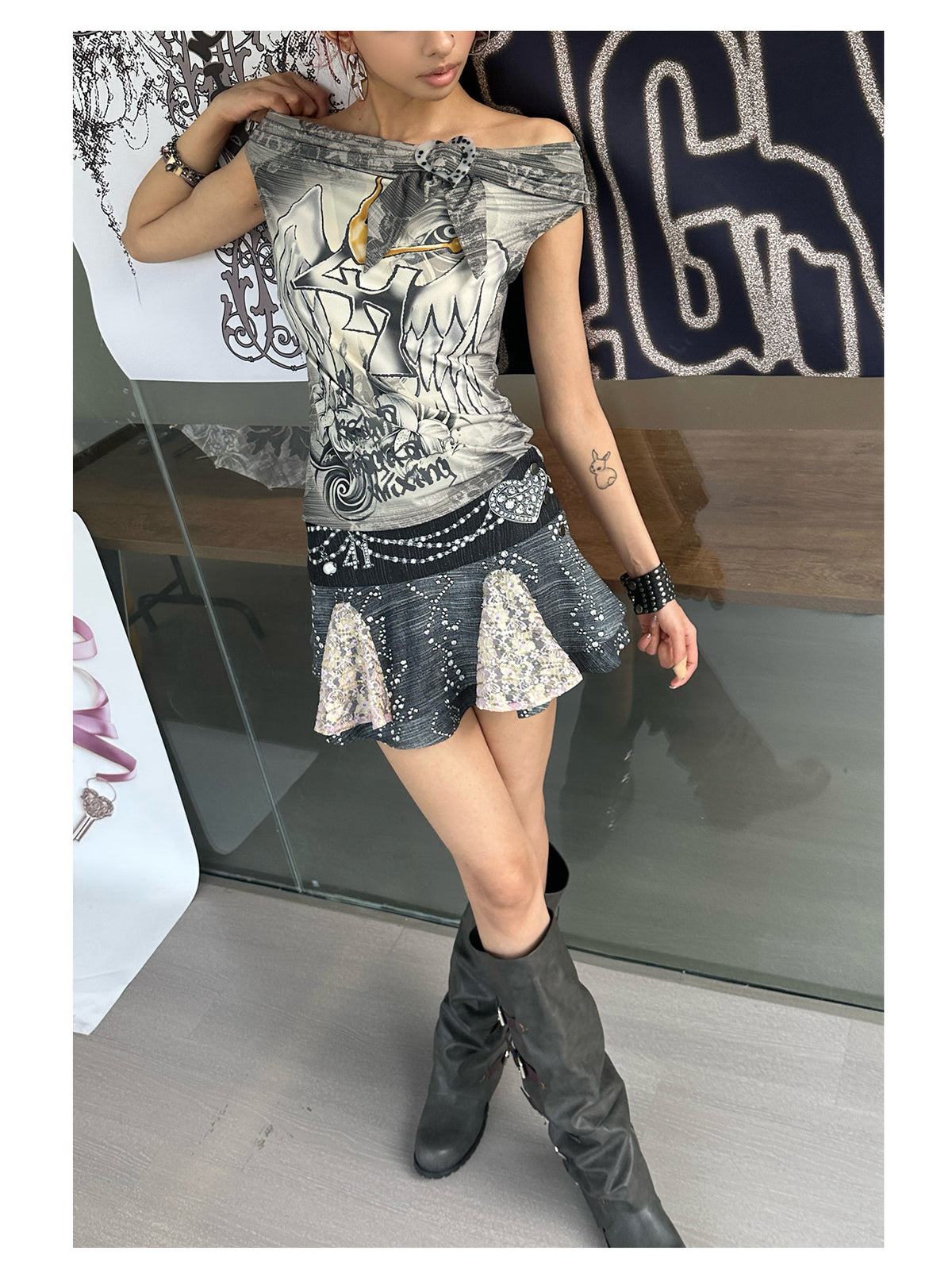 4RE1GN JEWEL denim-print lace mini skirt in black multicolor — angled modeled view showing the printed waistband and lace panels