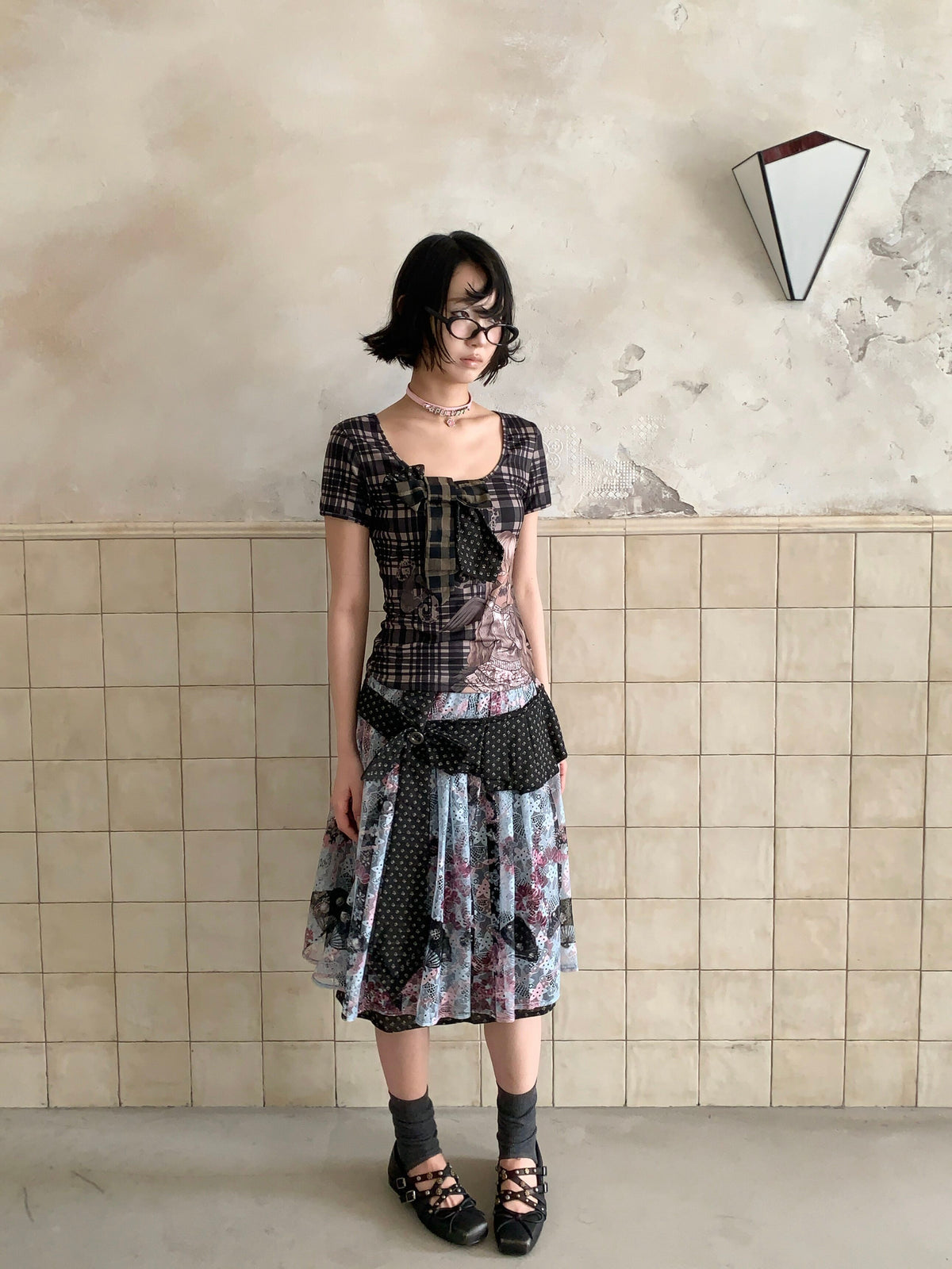 4RE1GN CROSS RIBBON jacquard lace layered skirt in multicolor — front modeled view styled with a plaid tee