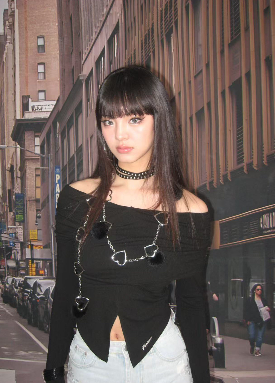 NEXT PASSPORT black cross-pleated off-shoulder long-sleeve top street close view