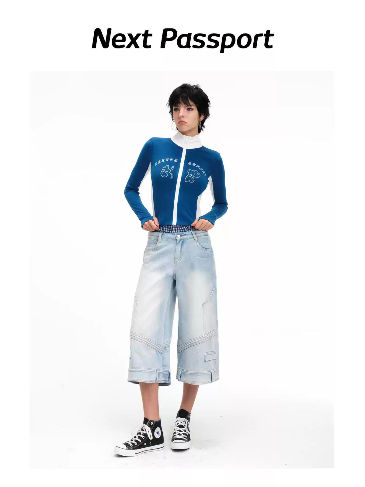 Straight-on modeled view of the light-blue wide-leg cropped jeans