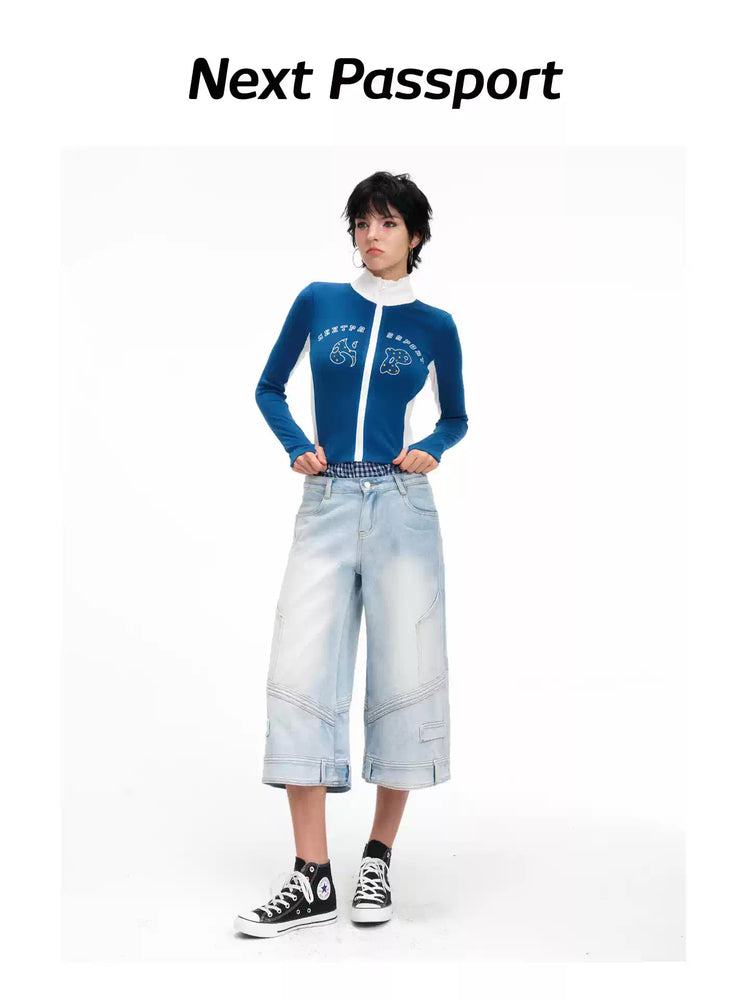 Straight-on modeled view of the light-blue wide-leg cropped jeans
