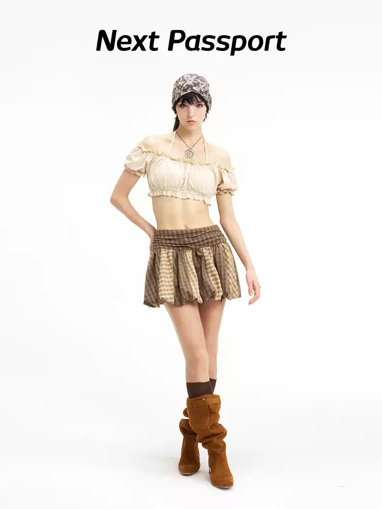 Rear three-quarter modeled view of the striped plaid mini skirt