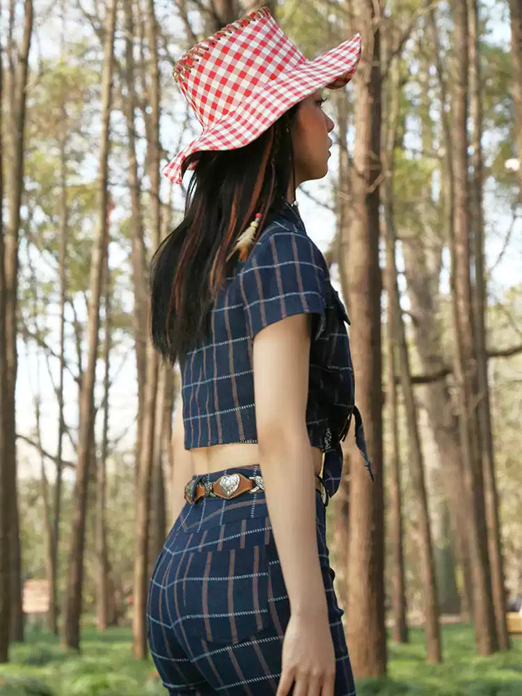 NEXT PASSPORT heart-cutout western PU belt in brown and silver — modeled side and back view.