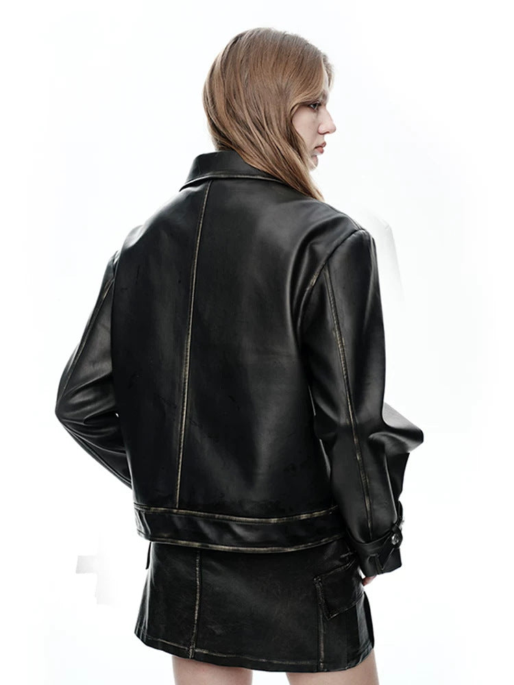 NEXT PASSPORT distressed black PU jacket and cargo-pocket mini skirt set, back view