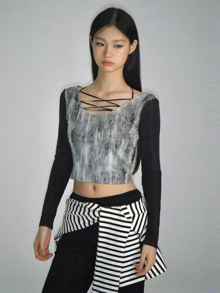 Full-length model view of the black tie-dye lace-up U-neck long-sleeve crop tee.