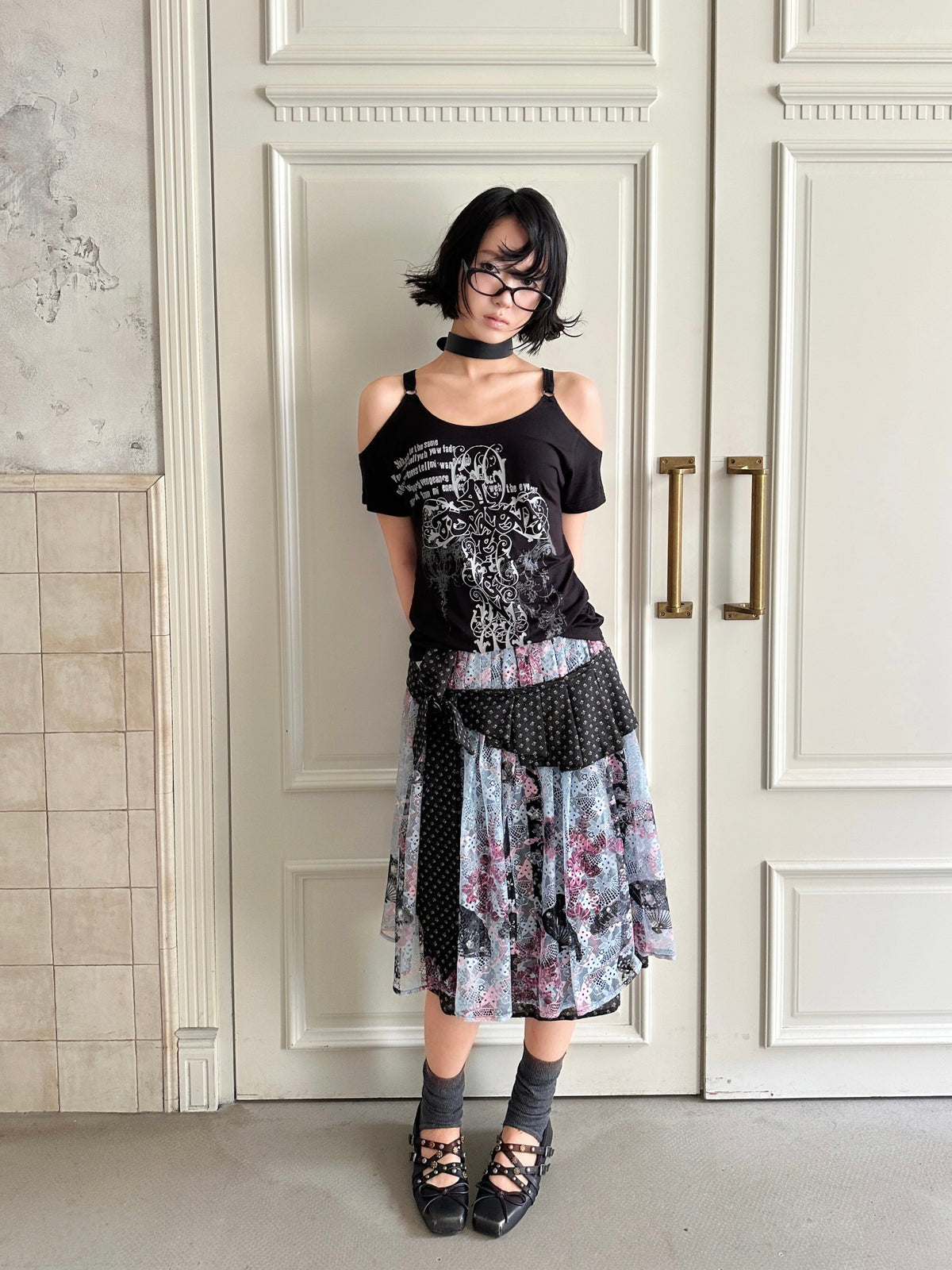 4RE1GN CROSS RIBBON jacquard lace layered skirt in multicolor — angled front modeled view with head tilted