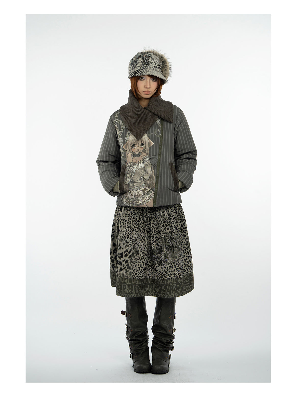 4RE1GN COMIC STRIPE asymmetric-collar down jacket in olive green — three-quarter modeled view styled with a leopard-print skirt