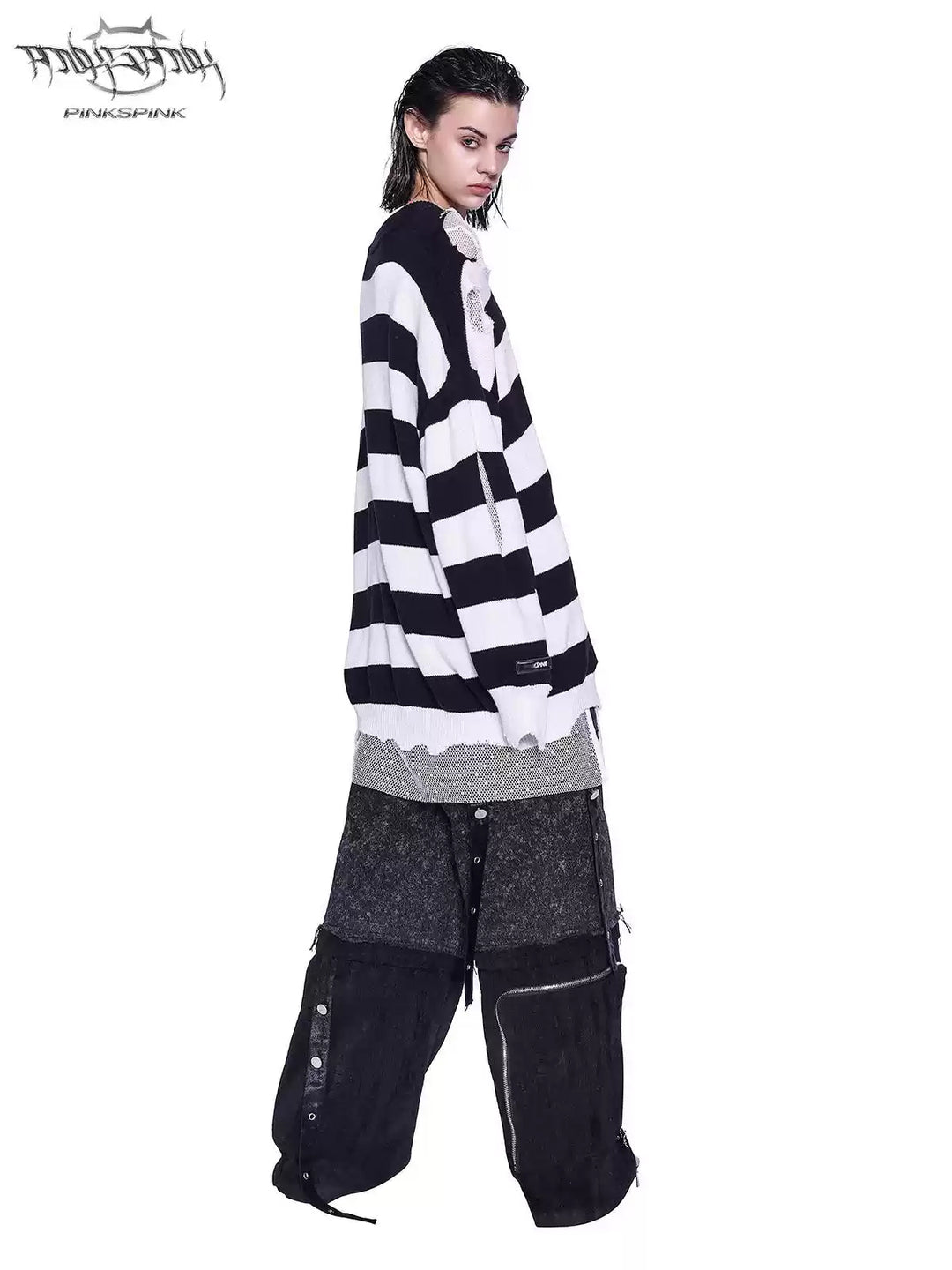 PINKSPINK ELECTRIC MOON distressed striped sweater in BLACK WHITE STRIPE — full-body side view showing the oversized knit drape.