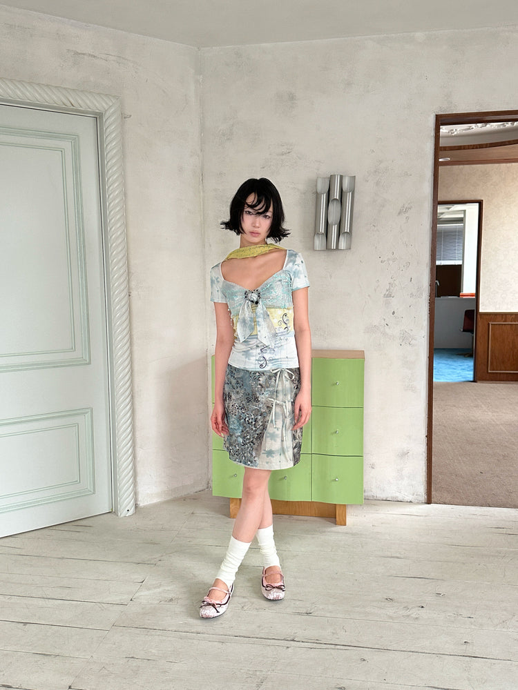 4RE1GN BLUE BLOOM tie-front layered skirt in blue multicolor — full-length front modeled view with the matching BLUE BLOOM tee