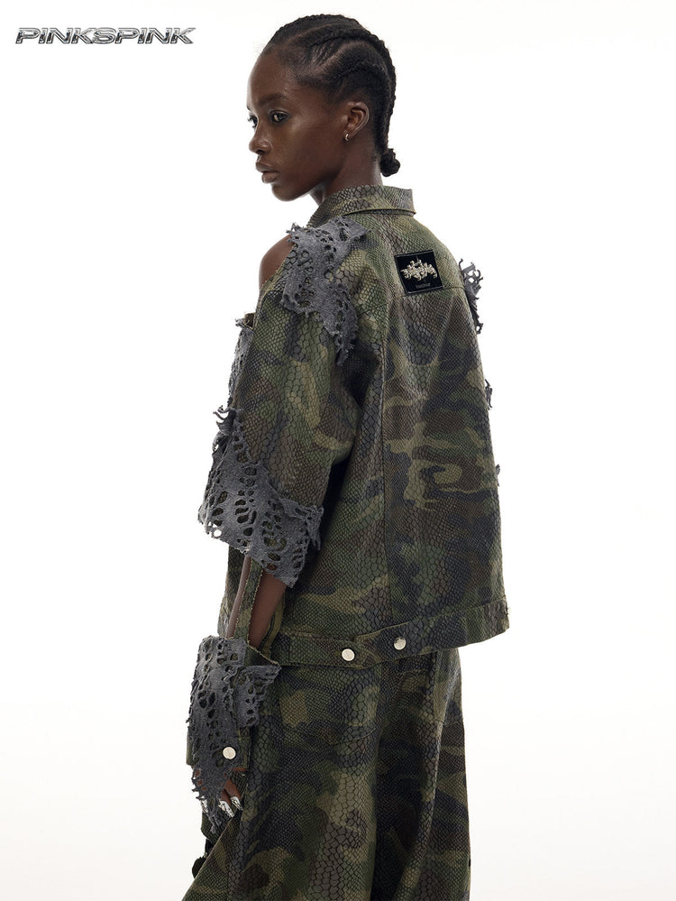 PINKSPINK ELECTRIC MOON distressed camouflage denim jacket — back three-quarter modeled view showing shoulder cutouts