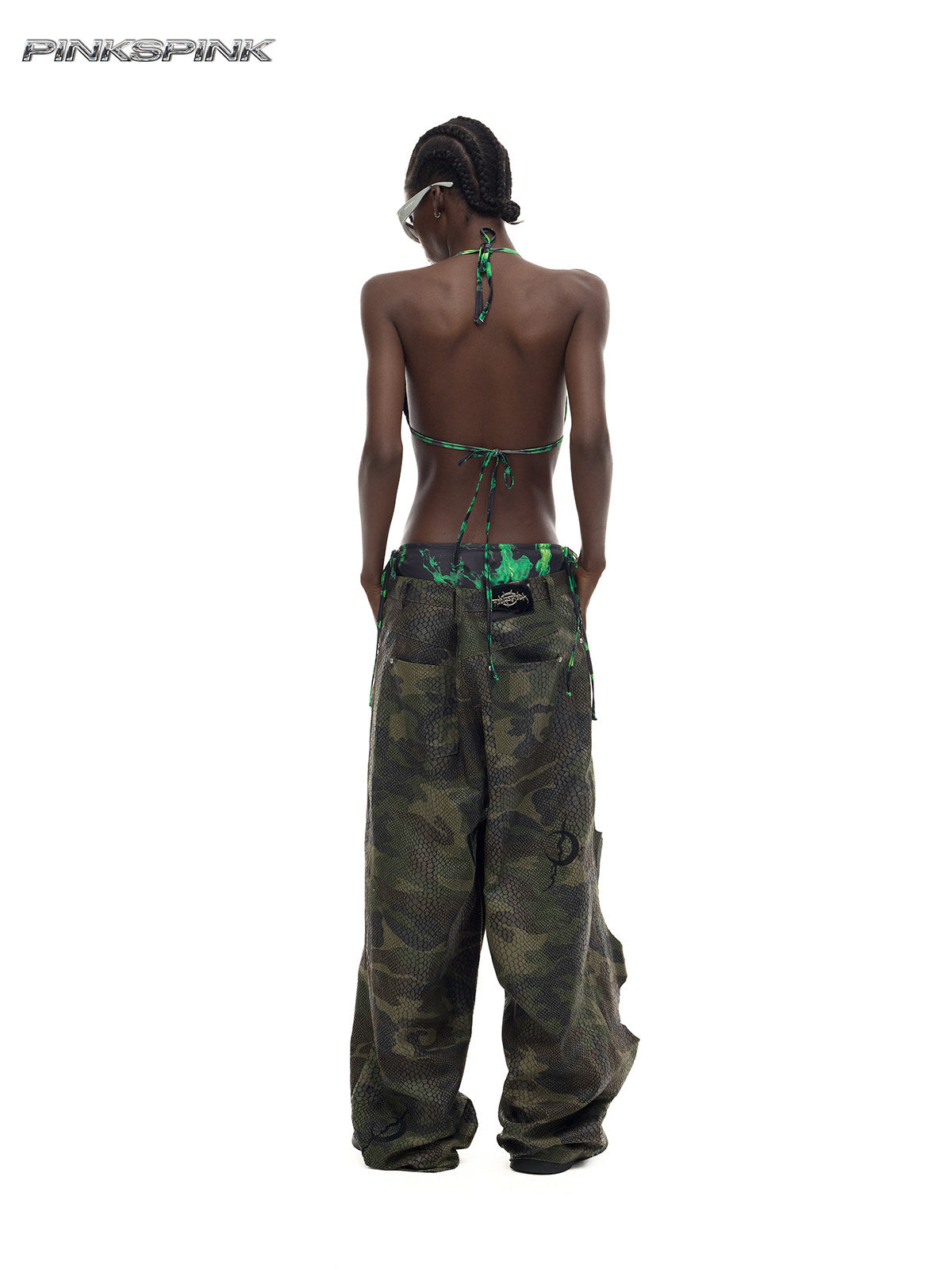 PINKSPINK DOUBLE STACK distressed camouflage wide-leg jeans — back full-length modeled view showing the low-rise waist
