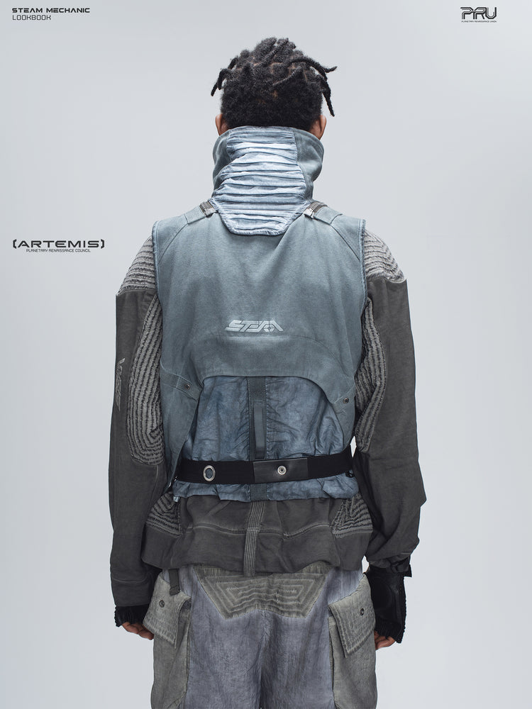 FISSION modular vest in star blue, back modeled view showing the pleated collar and rear pouch