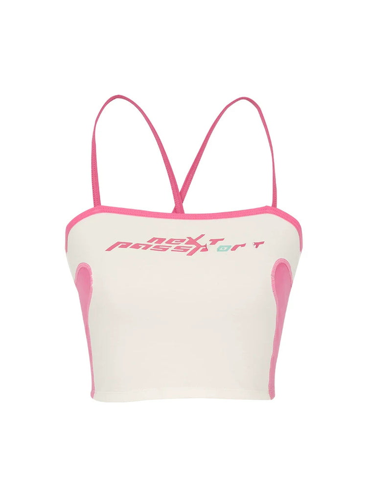 NEXT PASSPORT RETROFUTURE color-block crop camisole — white garment-only front view with pink contrast trim and chest logo.