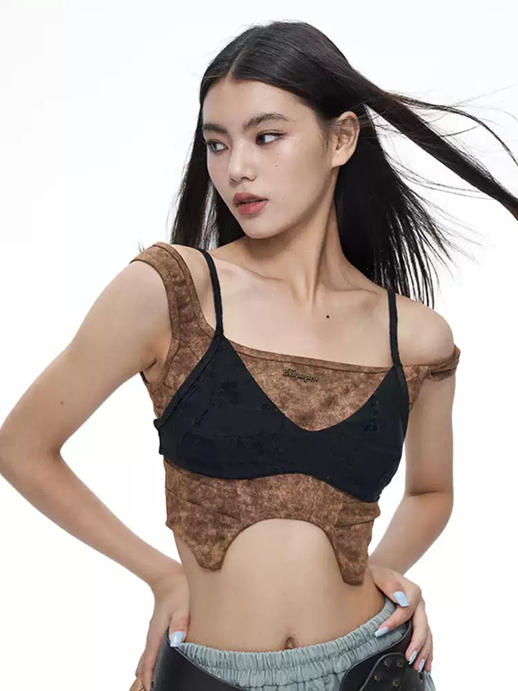 NEXT PASSPORT wasteland-brown shark-pleat vest and mini skirt — front three-quarter modeled view