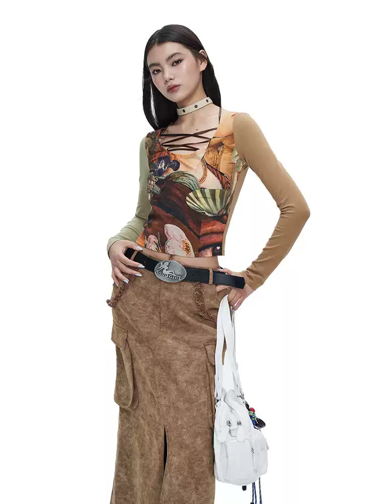 Three-quarter view of NEXT PASSPORT brown raw-edge slit denim maxi skirt