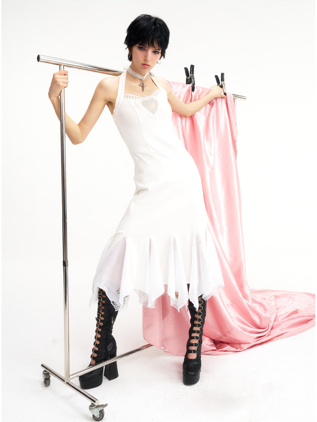 NEXT PASSPORT swan-embroidered lace ballet dress in ivory — long halter-length editorial studio view.